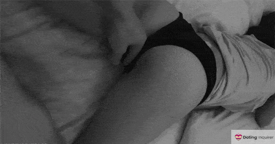 male teasing female on bed after meeting on USASexGuide 