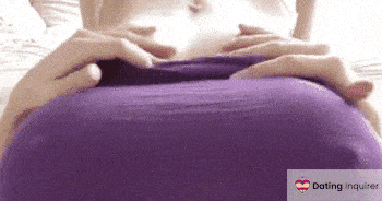 girl touching herself while laying on bed for her free fuck site page