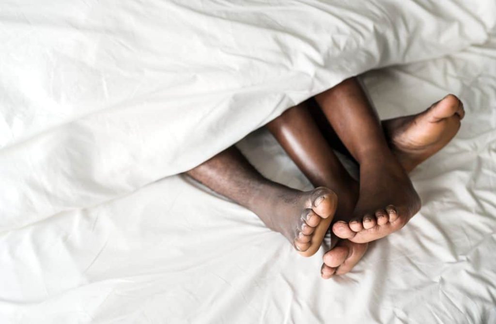 a black couple who met in black people meet dating site having sex in bed 