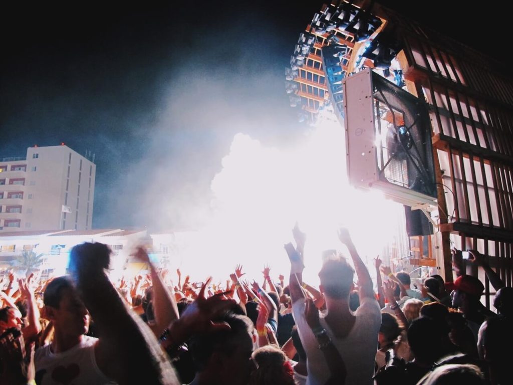 people partying outside during a concert